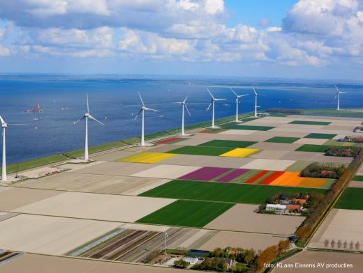 Dutch wind turbines on land reclaimed from the sea.